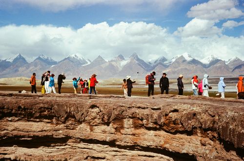 Chinese tourists at a volcanic crater, Tashkurgan, Xinjiang, China
