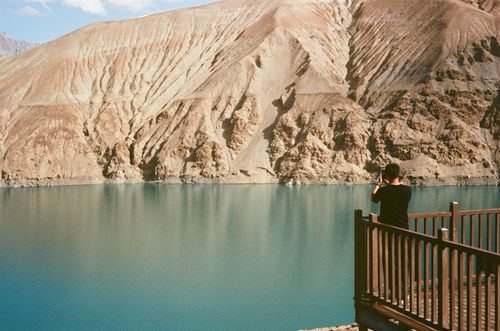 Photographer at a lake, Xinjiang, China