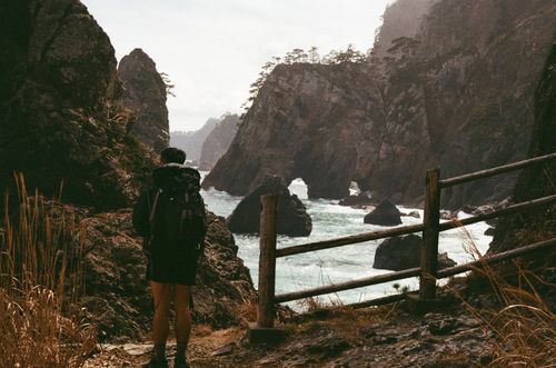 Man and rock formations, Kitayamazaki, Japan